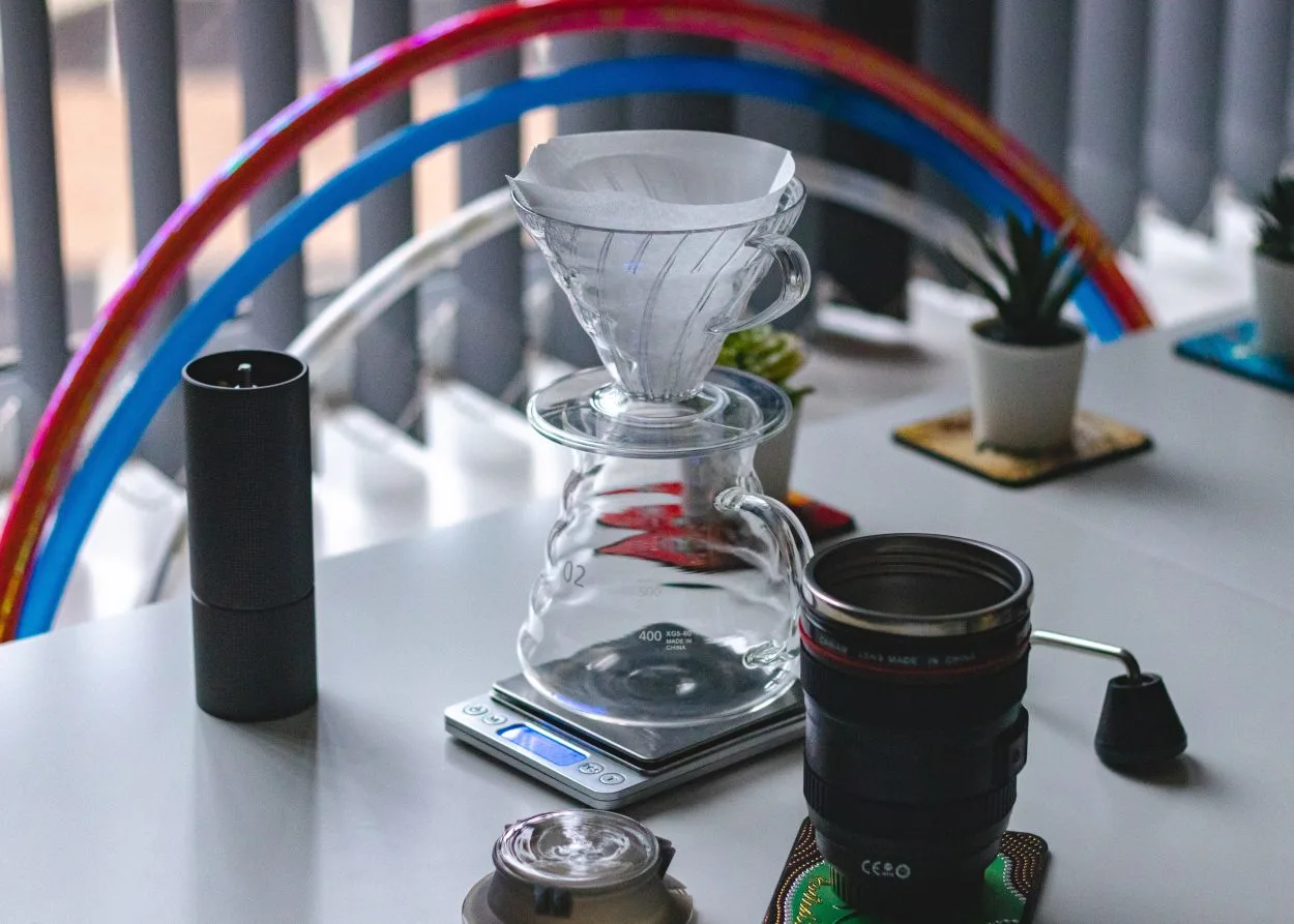 a celvver dripper with coffee mug and scale