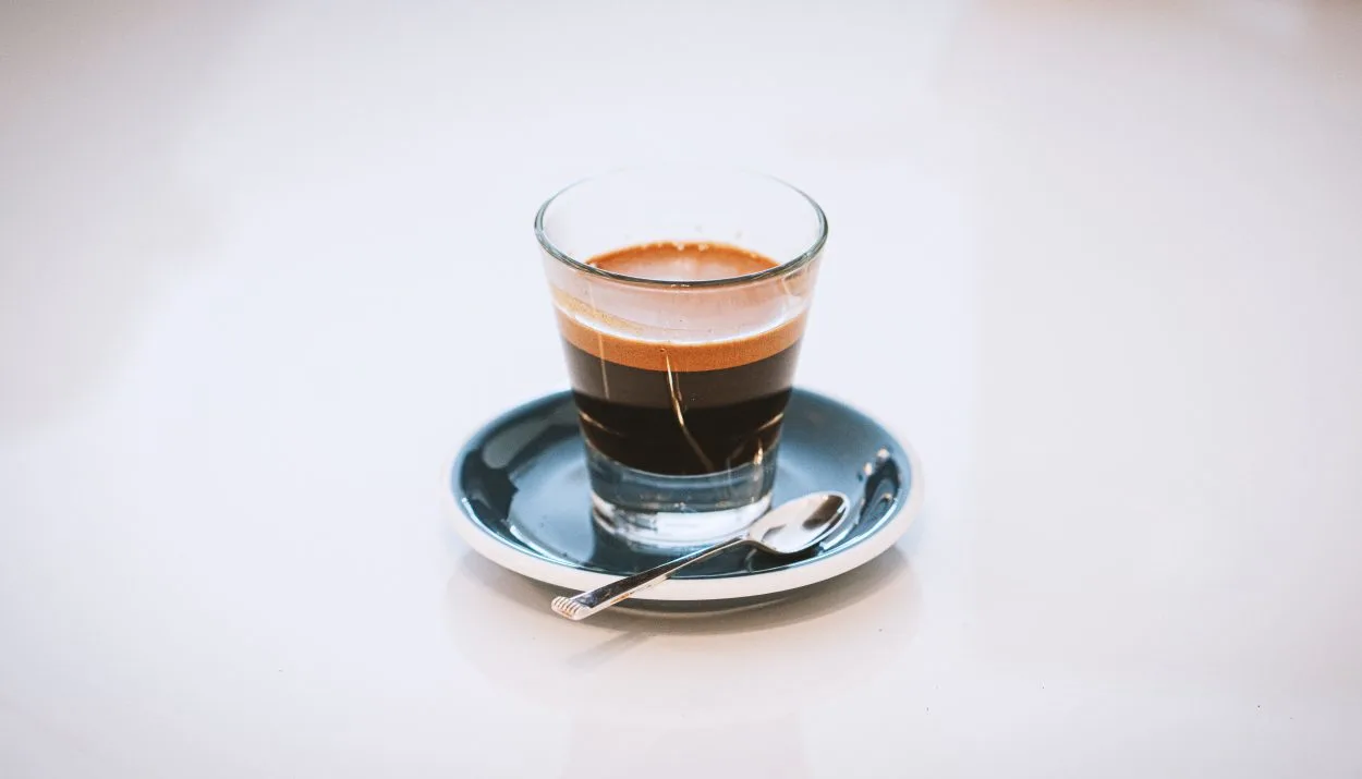a shot of espresso on a table