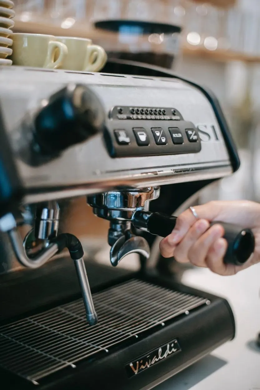 An espresso machine being used.