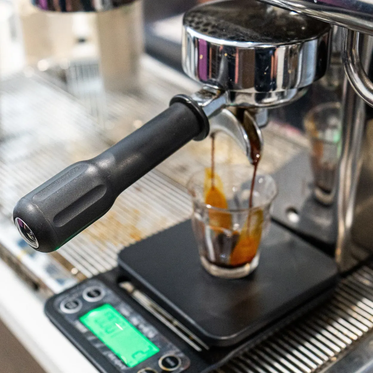 a fresh espresso being brewed. 