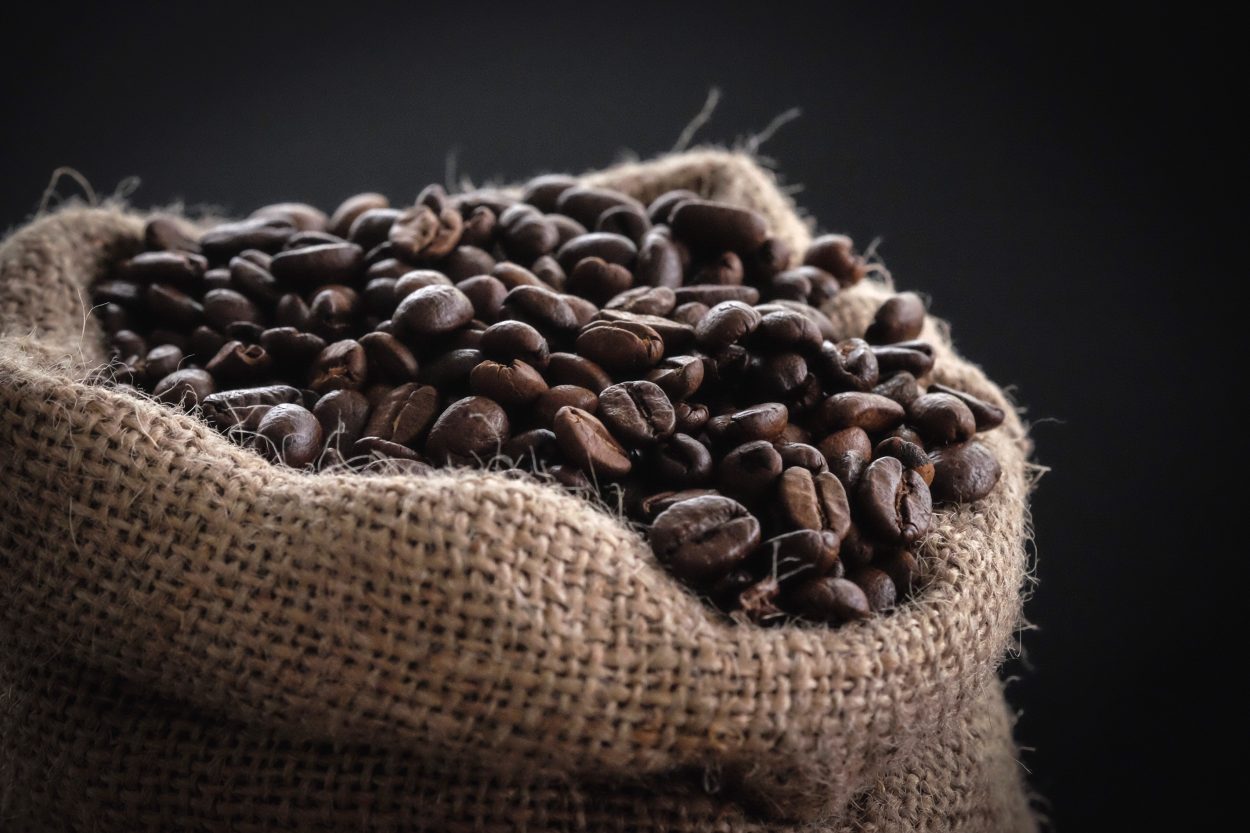 a bag of roasted coffee beans