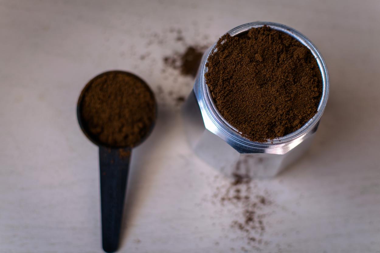 Espresso powder in a steel container.