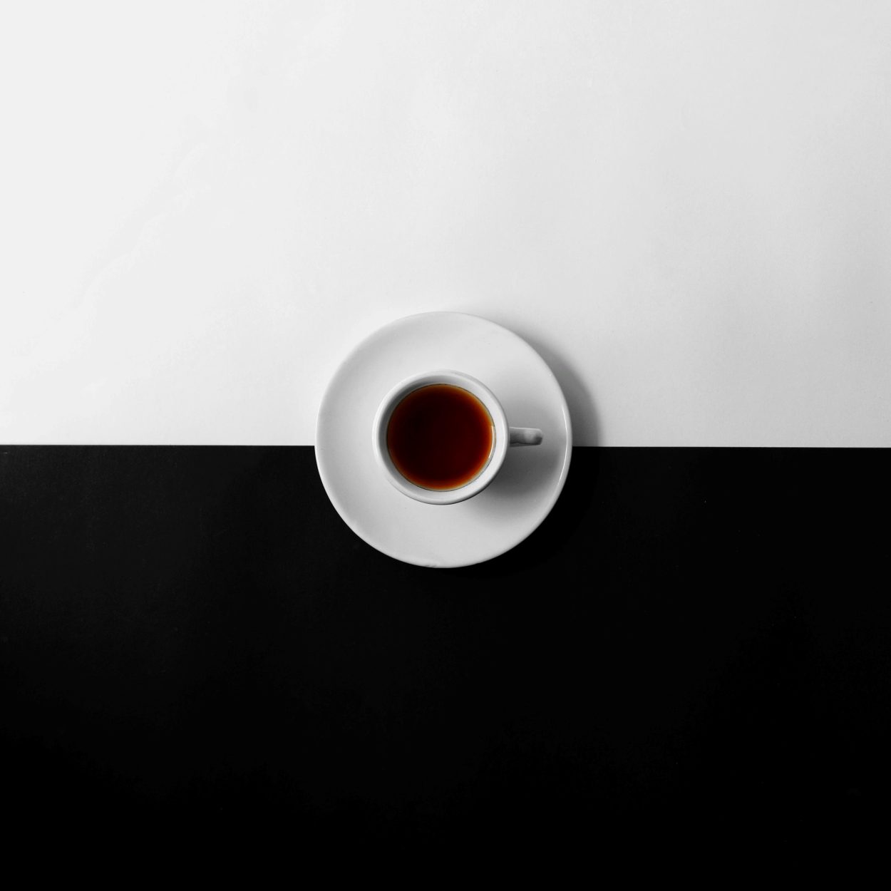 coffee on a black and white platform
