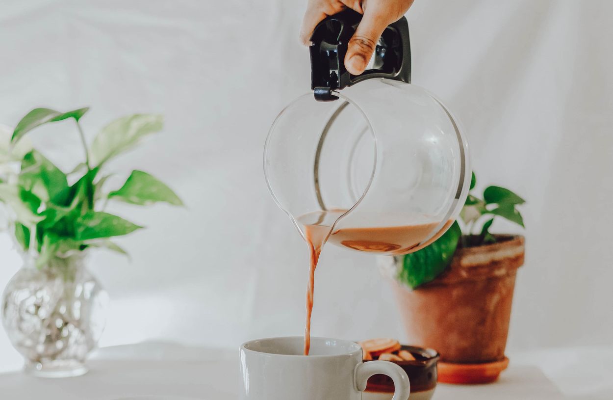 coffee being poured from a coffee pot
