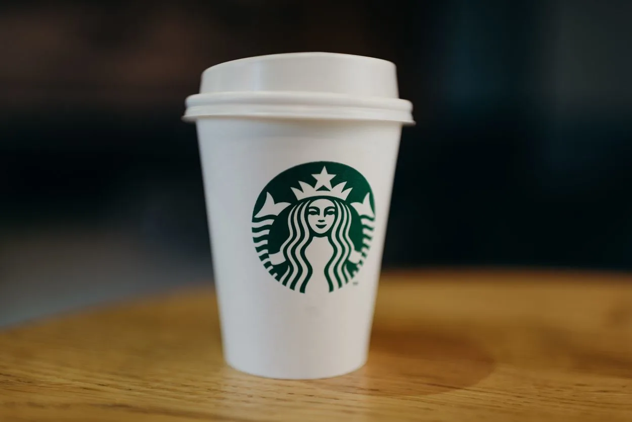 A to-go cup of Starbucks coffee,
