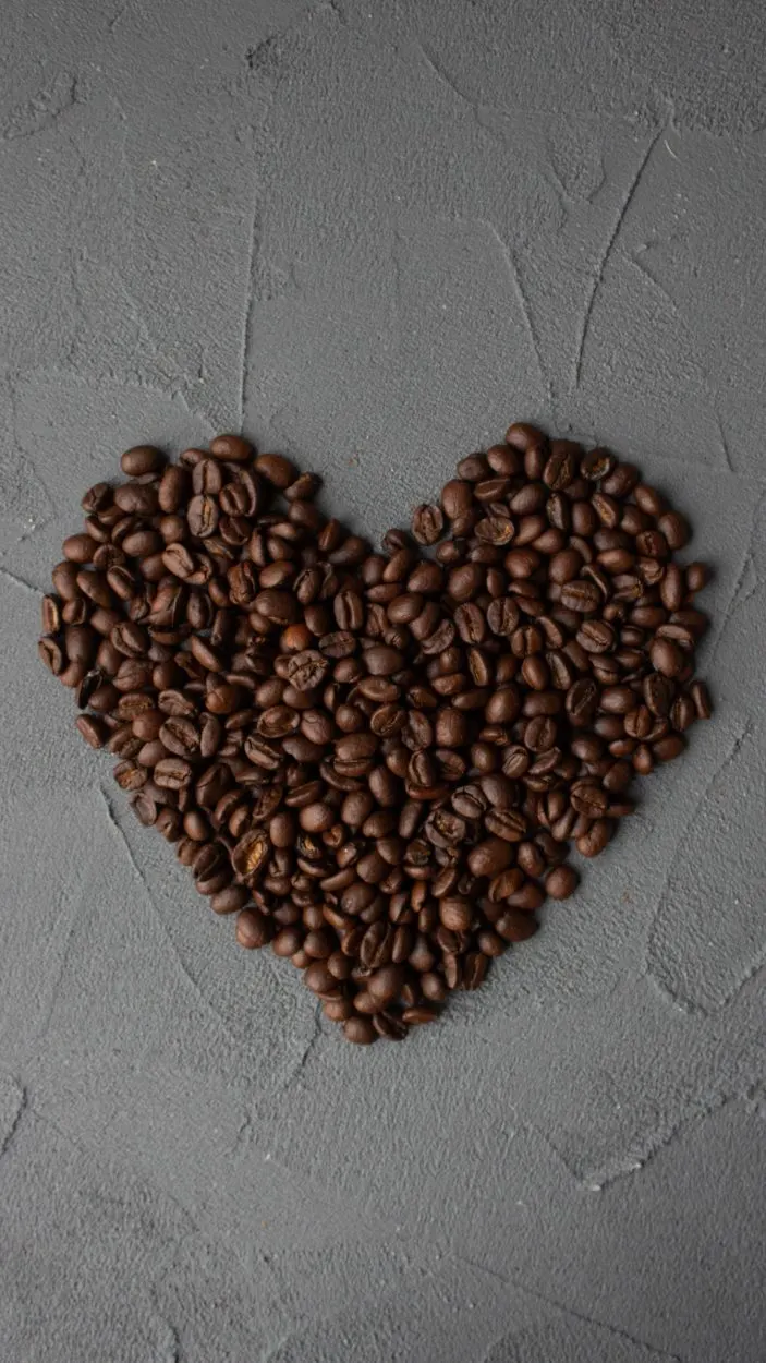 Coffee beans forming a heart.