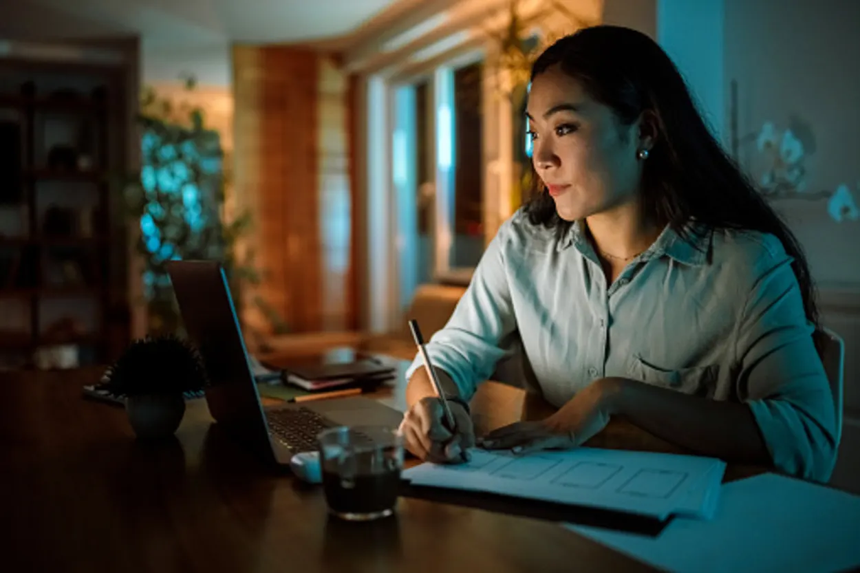 Young asian woman working from home office