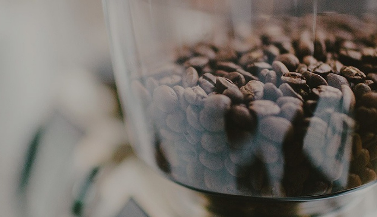 An image of Coffee Beans in the grinder.